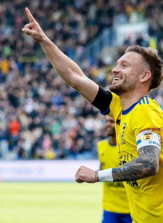Speler juicht voor de tribune