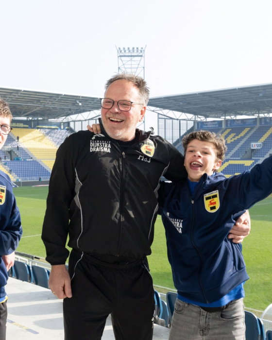Supporters juichen op de tribune