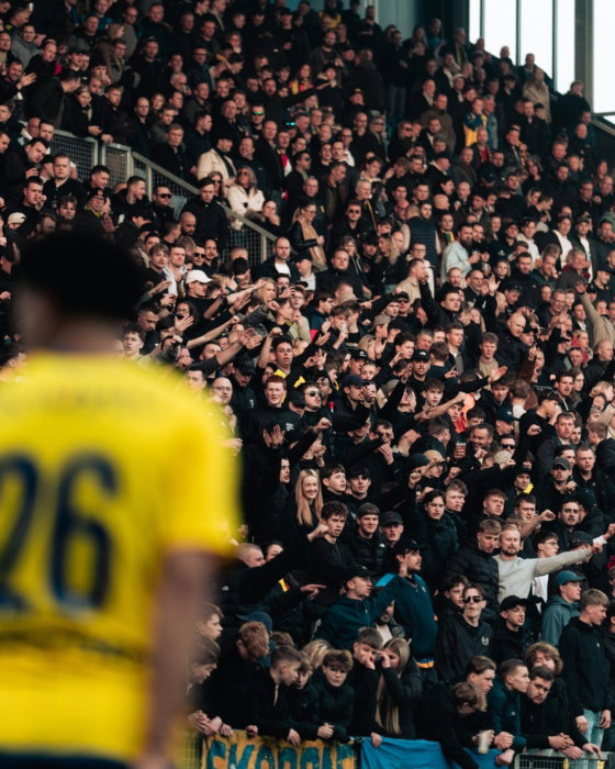 Speler met nummer 26 voor het publiek
